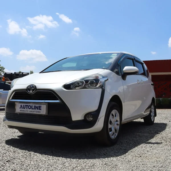 White Toyota Sienta 2018 viewed from front angle, compact MPV by Toyota